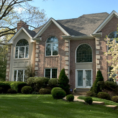front of home with large windows