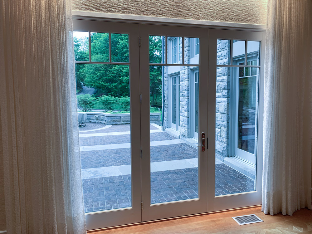 large windows and door with clear film
